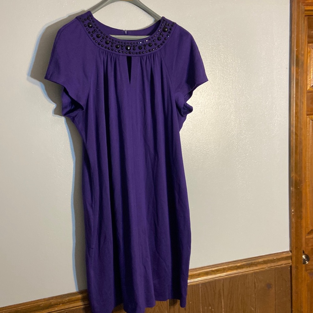 Woman’s top, black beading around color